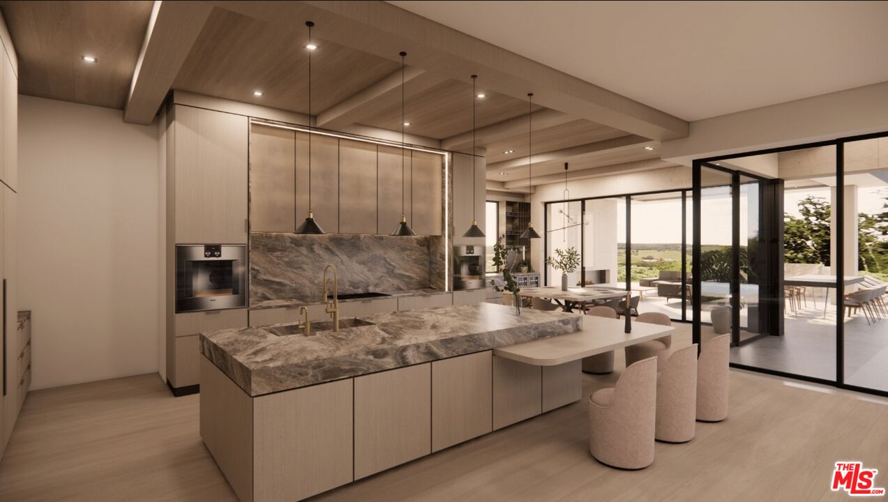 590 North Tigertail Road Los Angeles, CA 90049 - Photo 39 of 69 a dining hall with stainless steel appliances granite countertop a sink and cabinets