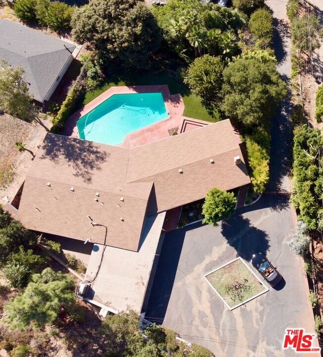 590 North Tigertail Road Los Angeles, CA 90049 - Photo 4 of 69 an aerial view of a house