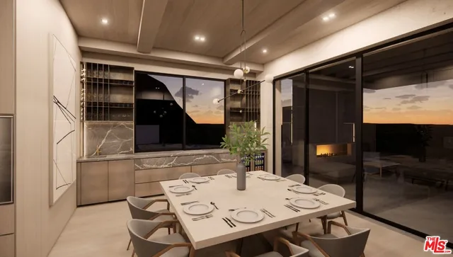 a living room with furniture and floor to ceiling window