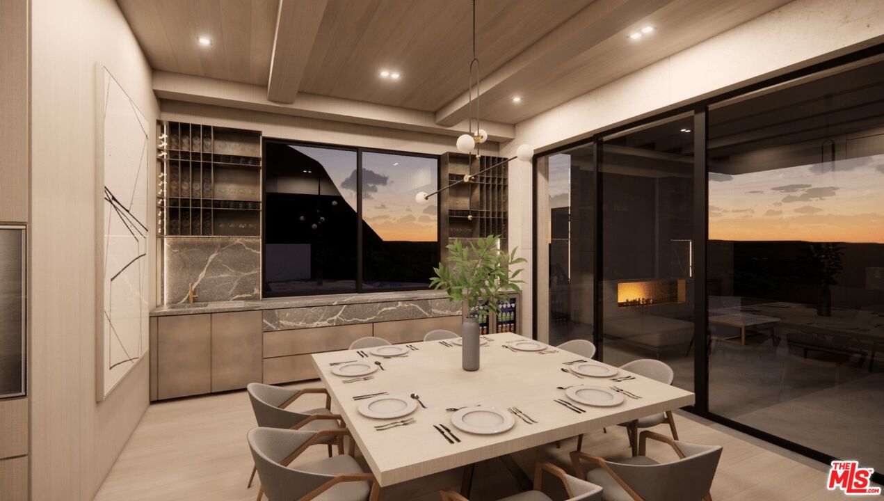 590 North Tigertail Road Los Angeles, CA 90049 - Photo 42 of 69 a view of kitchen and dining area with furniture