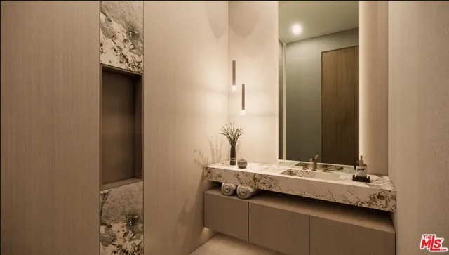 a bedroom with a bed and a flat tv screen on wall