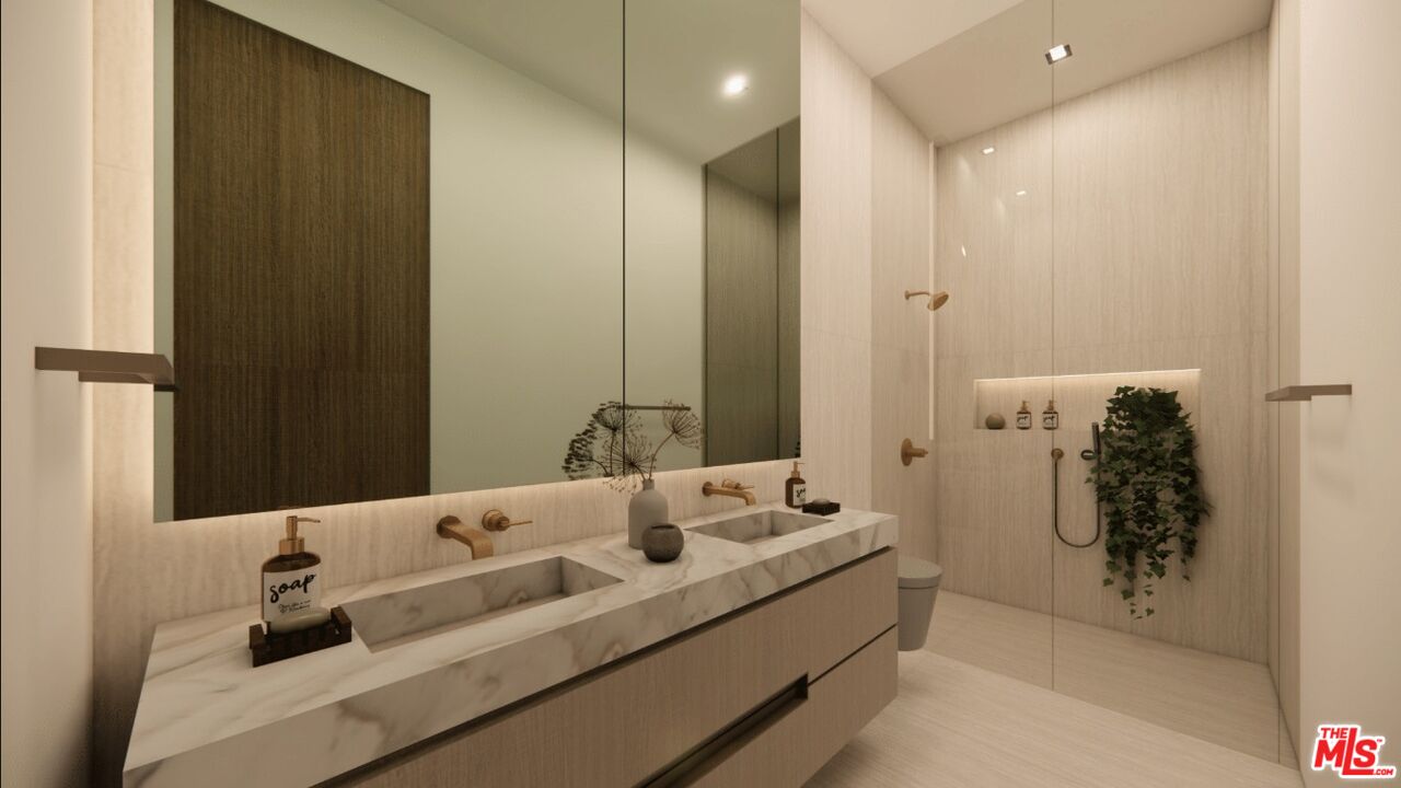 590 North Tigertail Road Los Angeles, CA 90049 - Photo 48 of 69 a bathroom with a tub sink and mirror