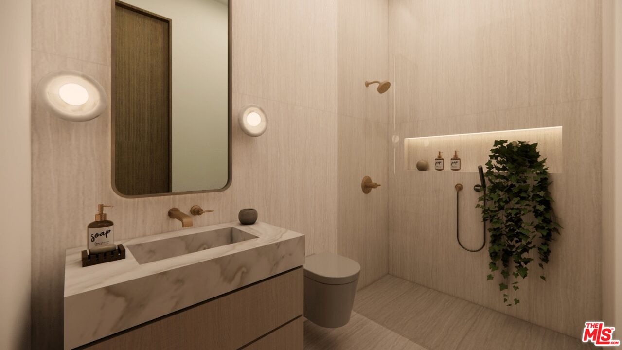 590 North Tigertail Road Los Angeles, CA 90049 - Photo 51 of 69 a bathroom with a sink toilet and shower