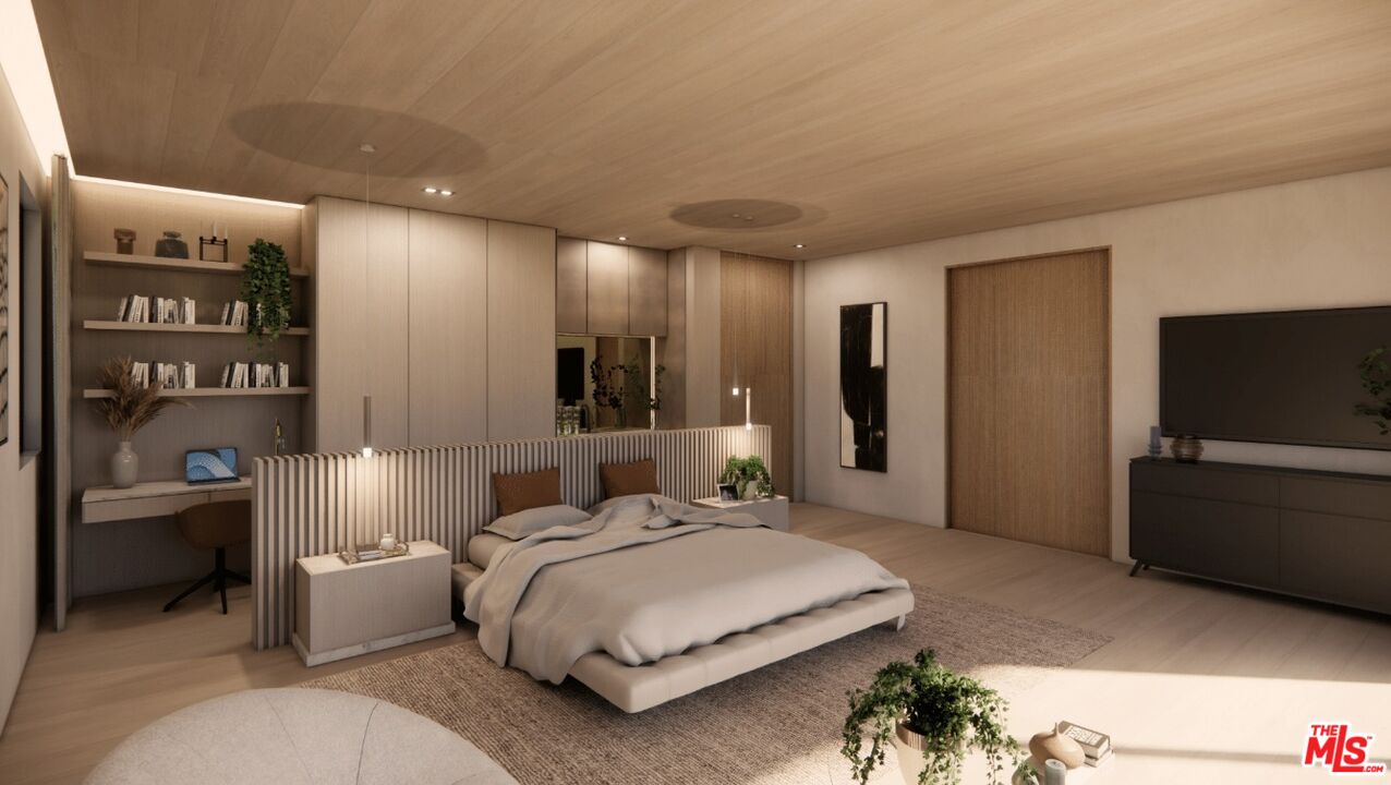 590 North Tigertail Road Los Angeles, CA 90049 - Photo 54 of 69 a bedroom with a bed and a walk in closet