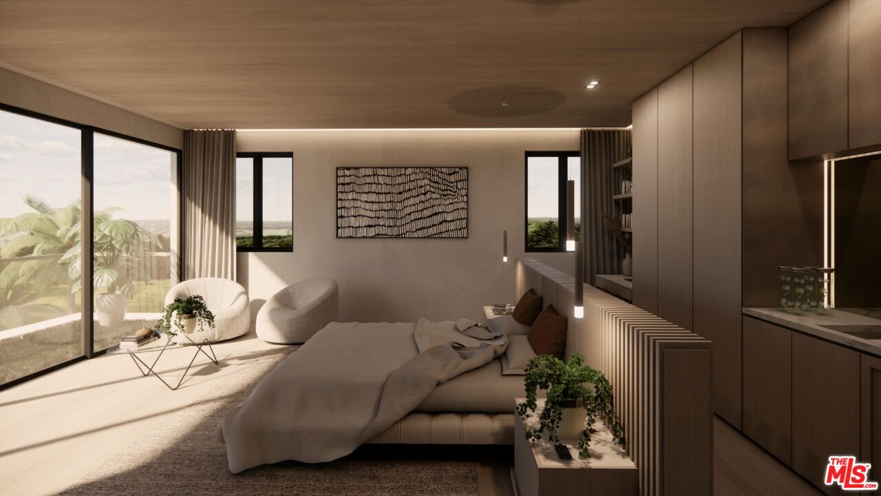 590 North Tigertail Road Los Angeles, CA 90049 - Photo 55 of 69 a living room with furniture and large windows