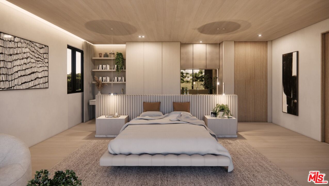 590 North Tigertail Road Los Angeles, CA 90049 - Photo 56 of 69 a spacious bedroom with a bed and a walk in closet