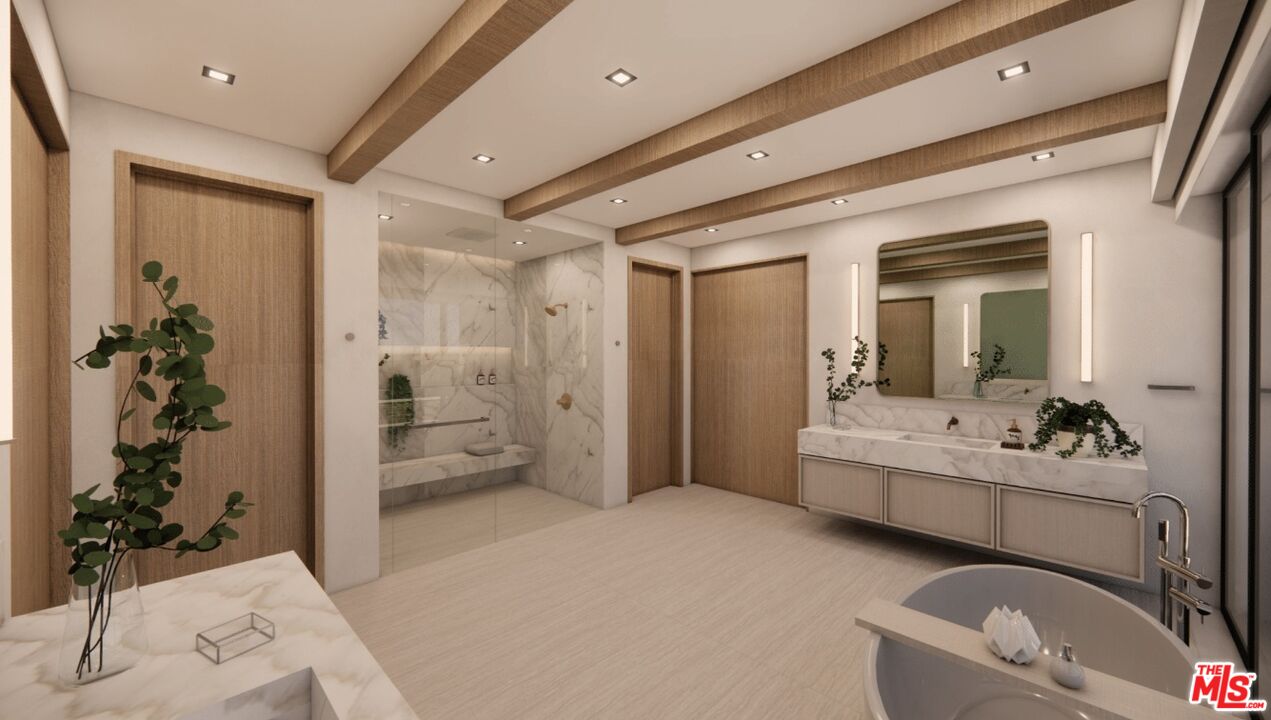 590 North Tigertail Road Los Angeles, CA 90049 - Photo 58 of 69 a en suite bathroom with a double vanity sink a large mirror and a shower