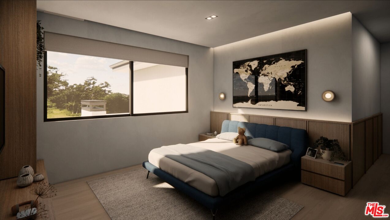 590 North Tigertail Road Los Angeles, CA 90049 - Photo 60 of 69 a bedroom with a bed and window