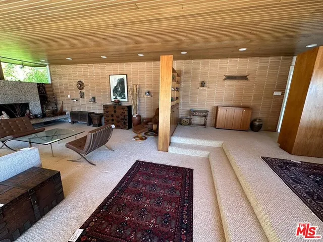 a view of a livingroom with furniture and windows