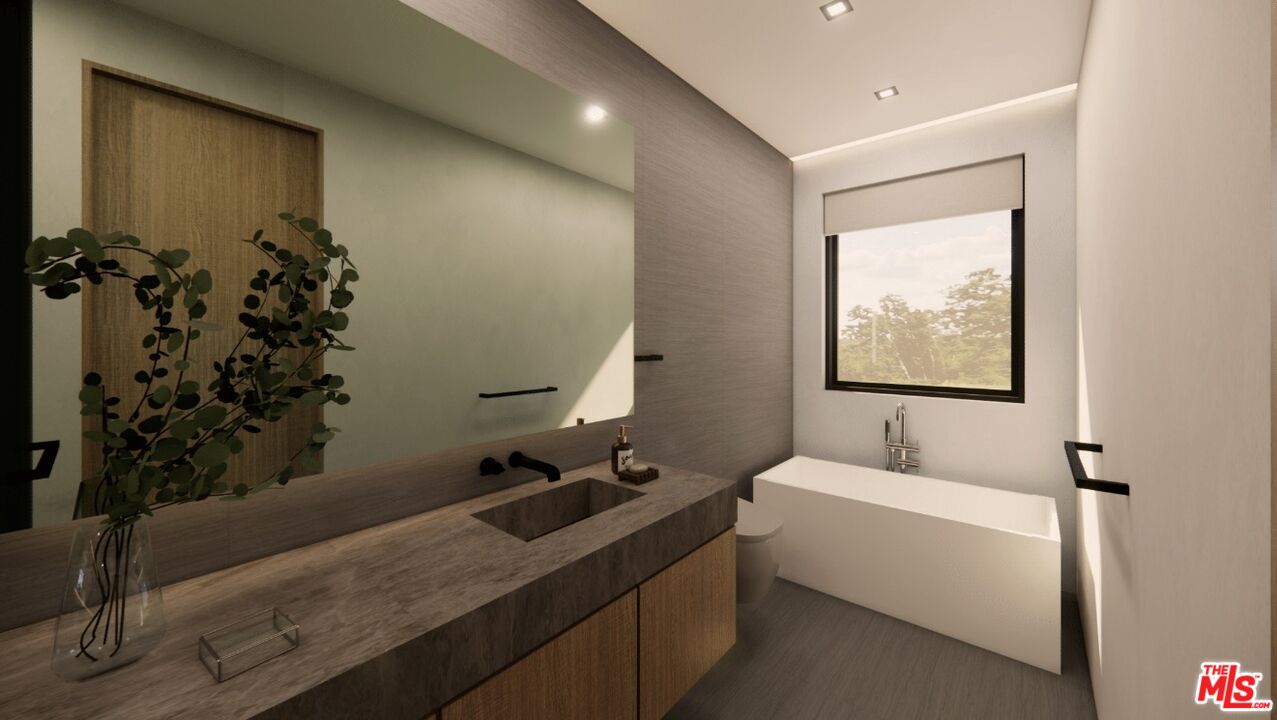 590 North Tigertail Road Los Angeles, CA 90049 - Photo 64 of 69 a bathroom with a bathtub and a sink