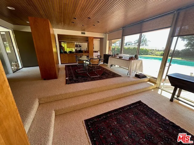a kitchen with sink a counter top space and appliances