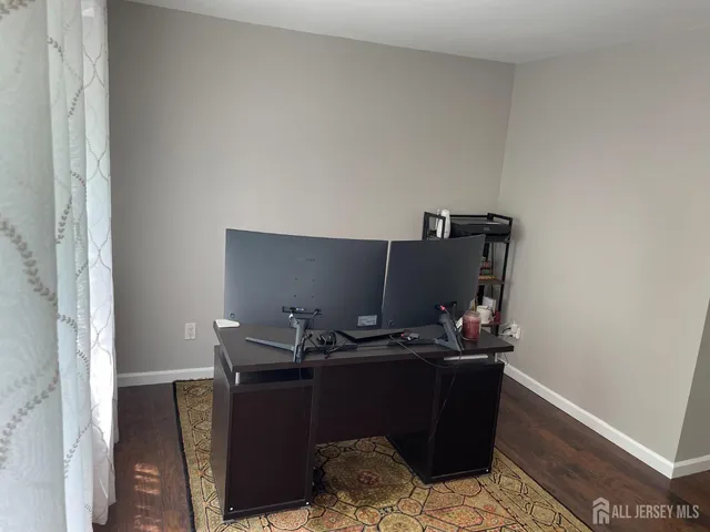 a room with furniture and air conditioner