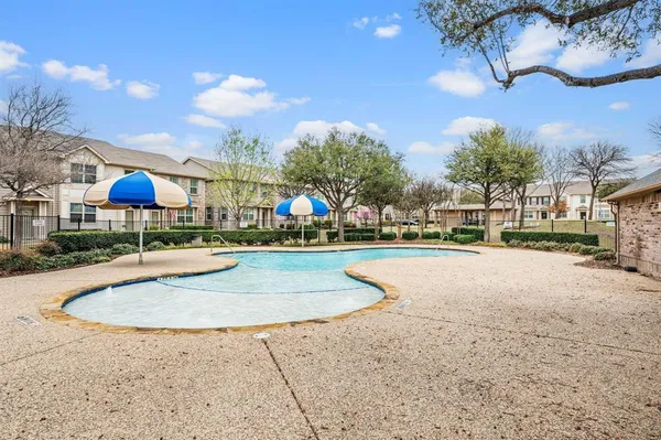 a view of outdoor space pool and green space