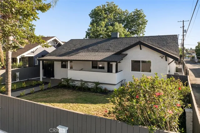 front view of a house with a yard
