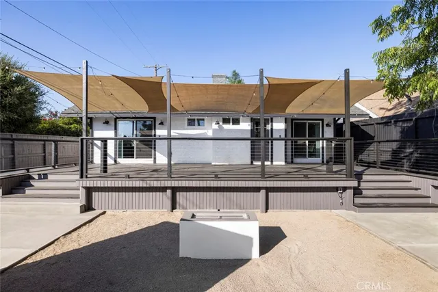 a bathroom with a shower and a sink
