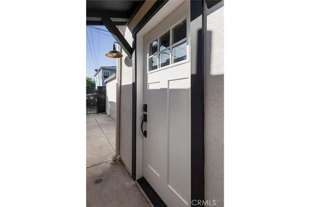 a room with cabinets and wooden floor