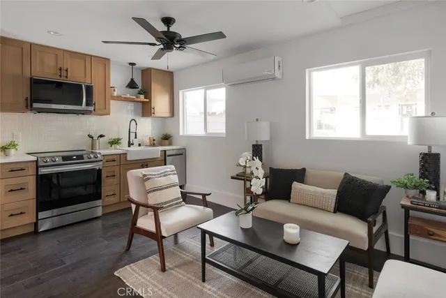 a living room with furniture and a table