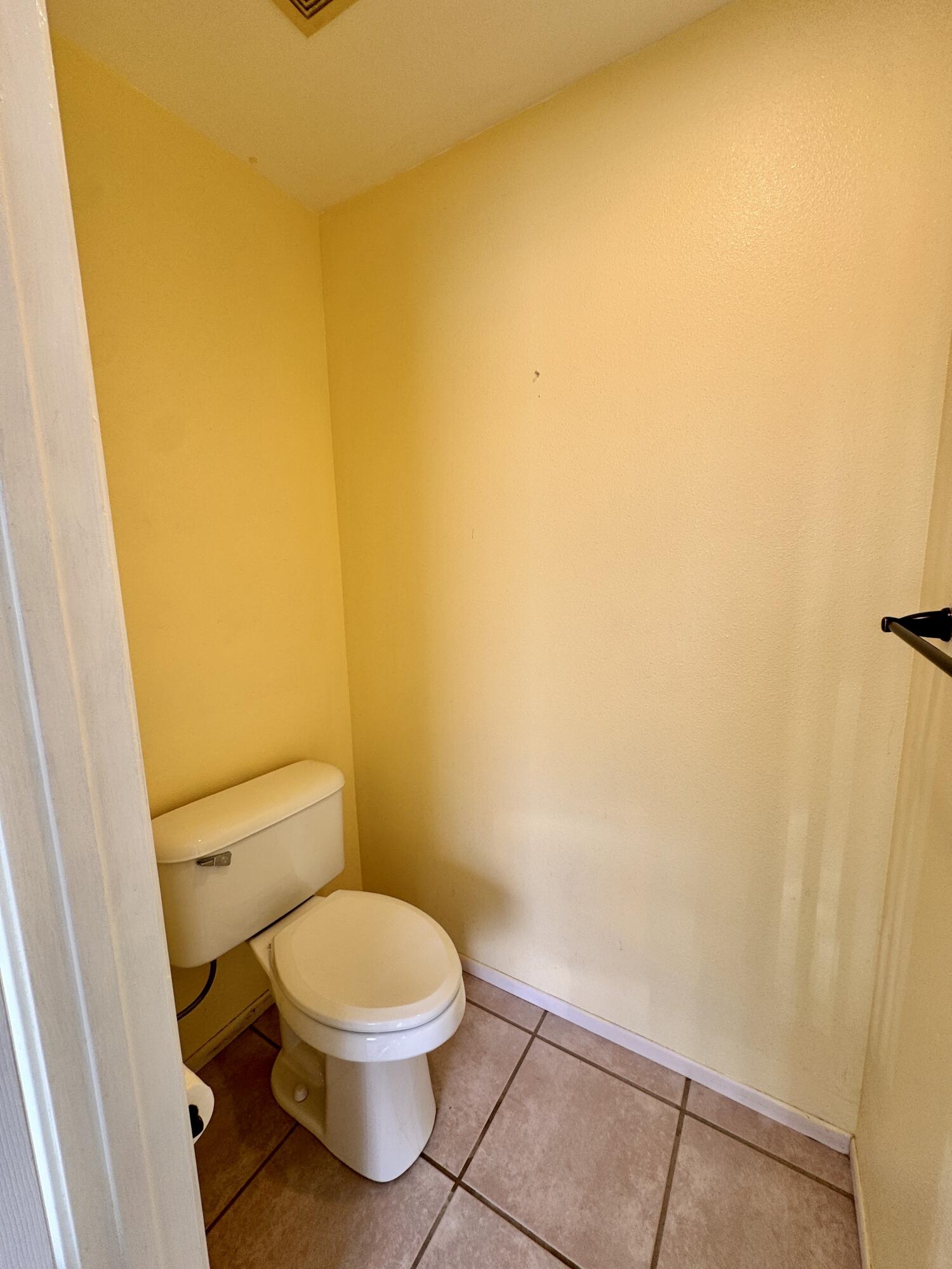 79585 Star Flower Trail La Quinta, CA 92253 - Photo 13 of 21 a white toilet sitting next to a shower