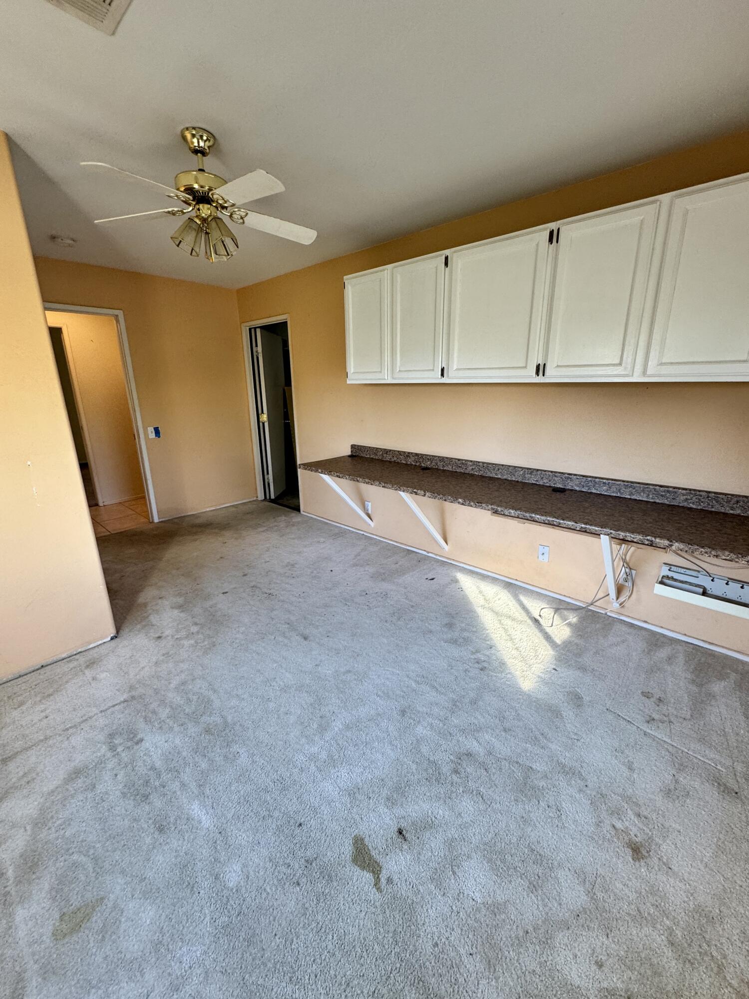 79585 Star Flower Trail La Quinta, CA 92253 - Photo 17 of 21 a view of a livingroom with a ceiling fan and a rug