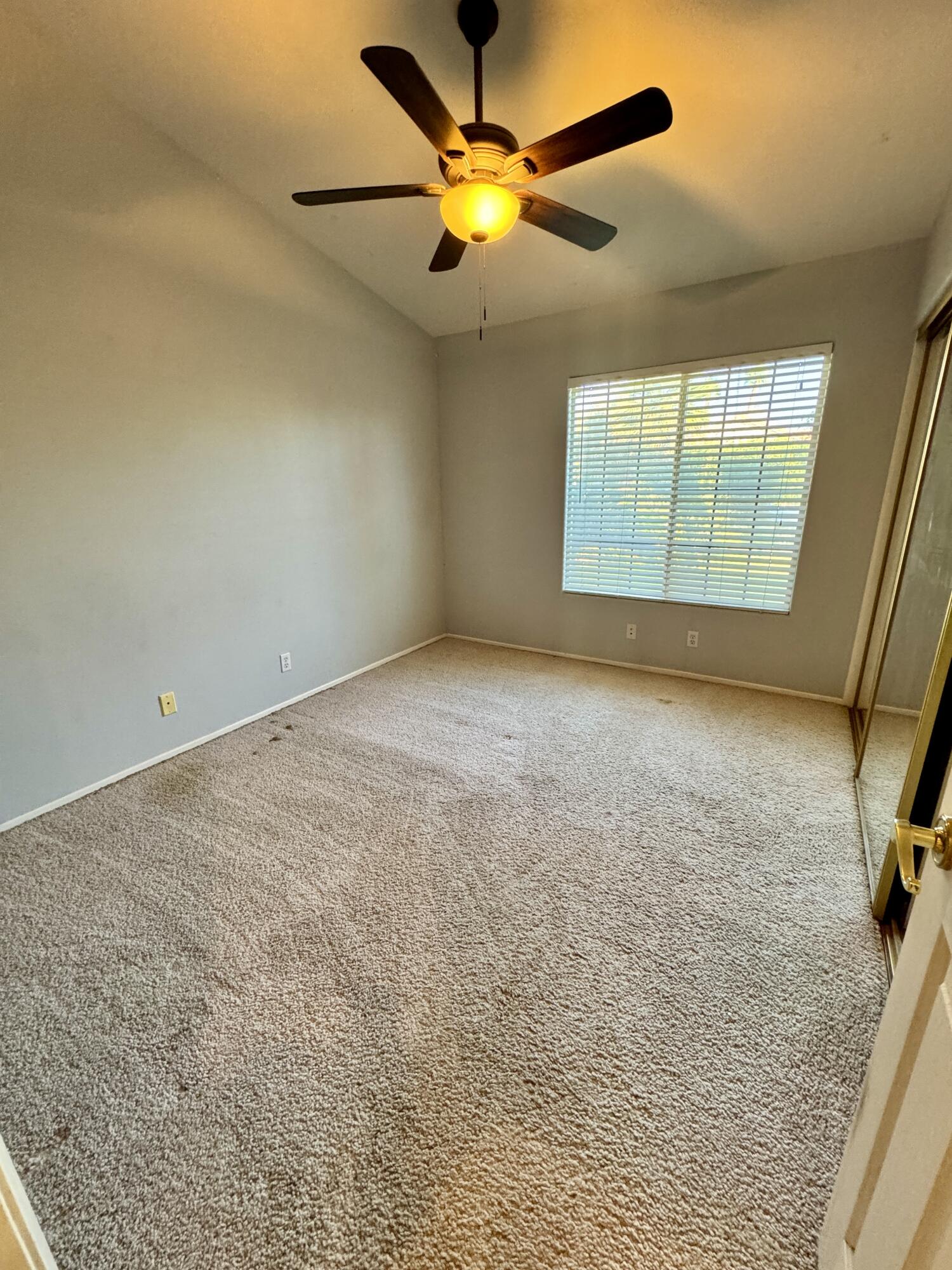 79585 Star Flower Trail La Quinta, CA 92253 - Photo 7 of 21 a view of an empty room with a window