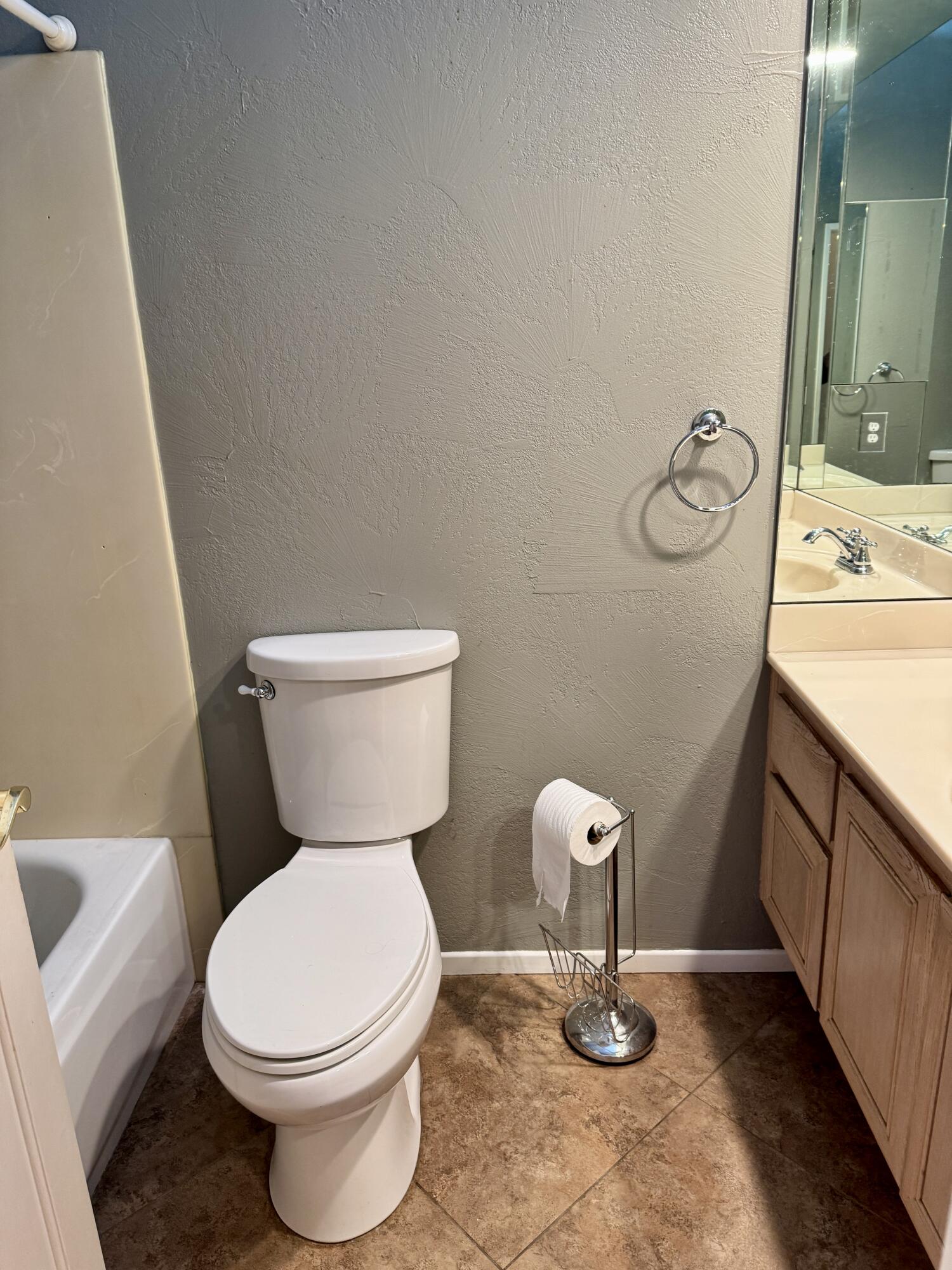 79585 Star Flower Trail La Quinta, CA 92253 - Photo 9 of 21 a bathroom with a toilet a sink and mirror