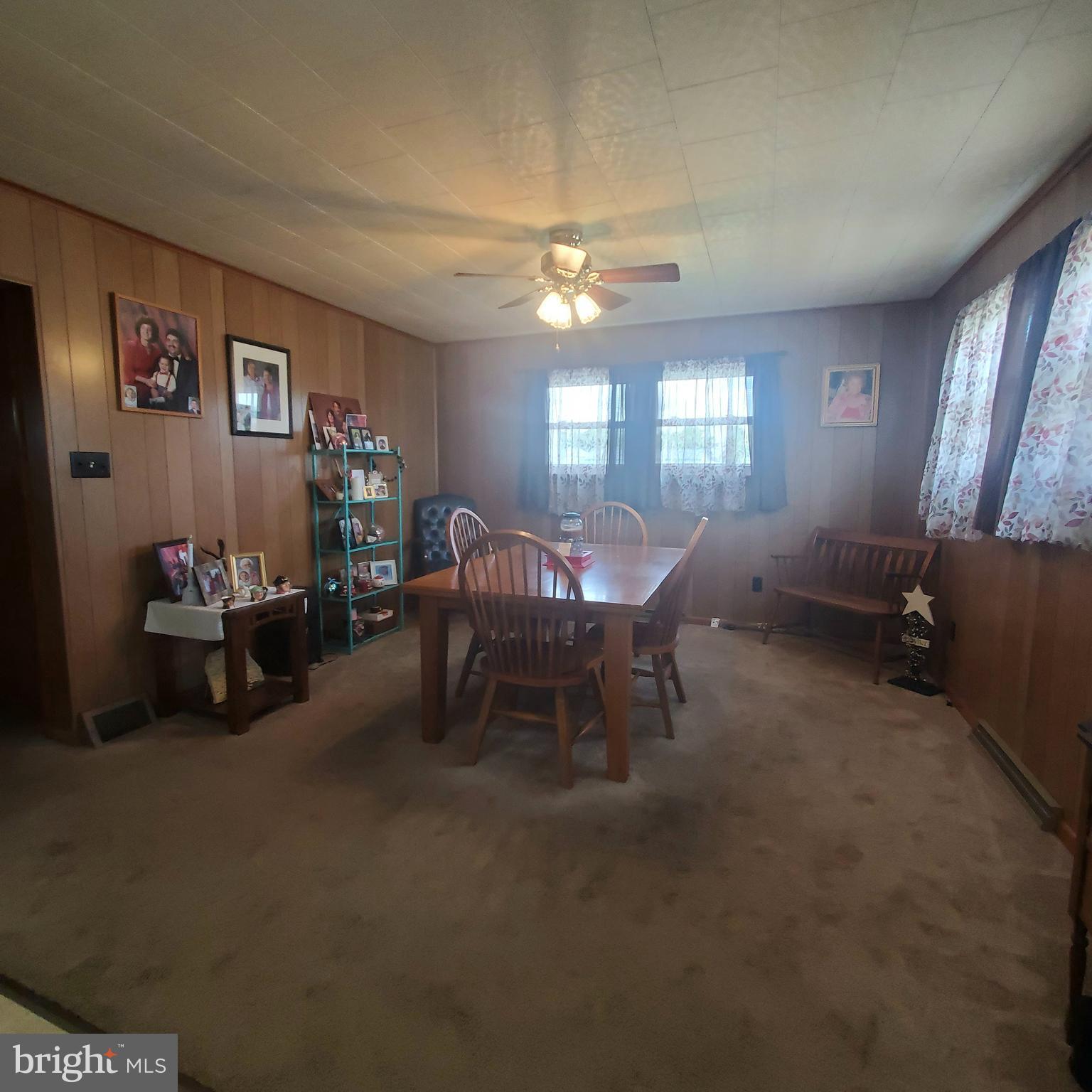 68 Amwellbury Road Salem, NJ 08079 - Photo 13 of 23 a living room with furniture and a chandelier