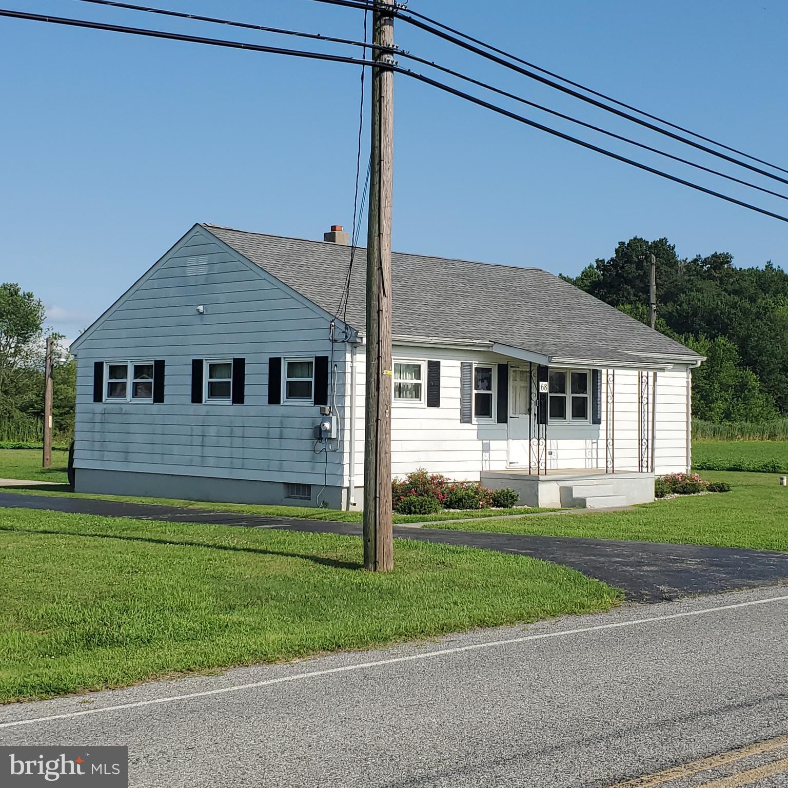 68 Amwellbury Road Salem, NJ 08079 - Photo 19 of 23 a front view of a house with a yard