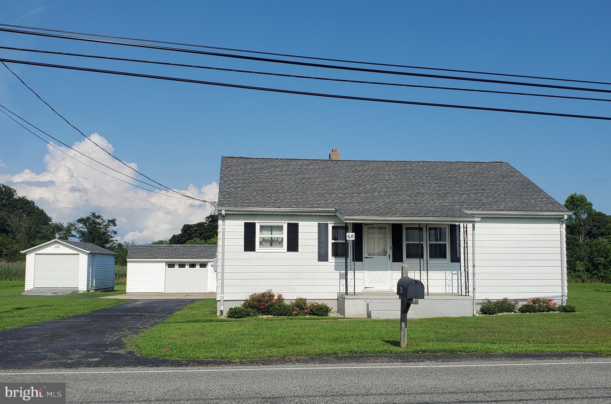 68 Amwellbury Road Salem, NJ 08079 - Photo 23 of 23 a house that has a tree in front of it