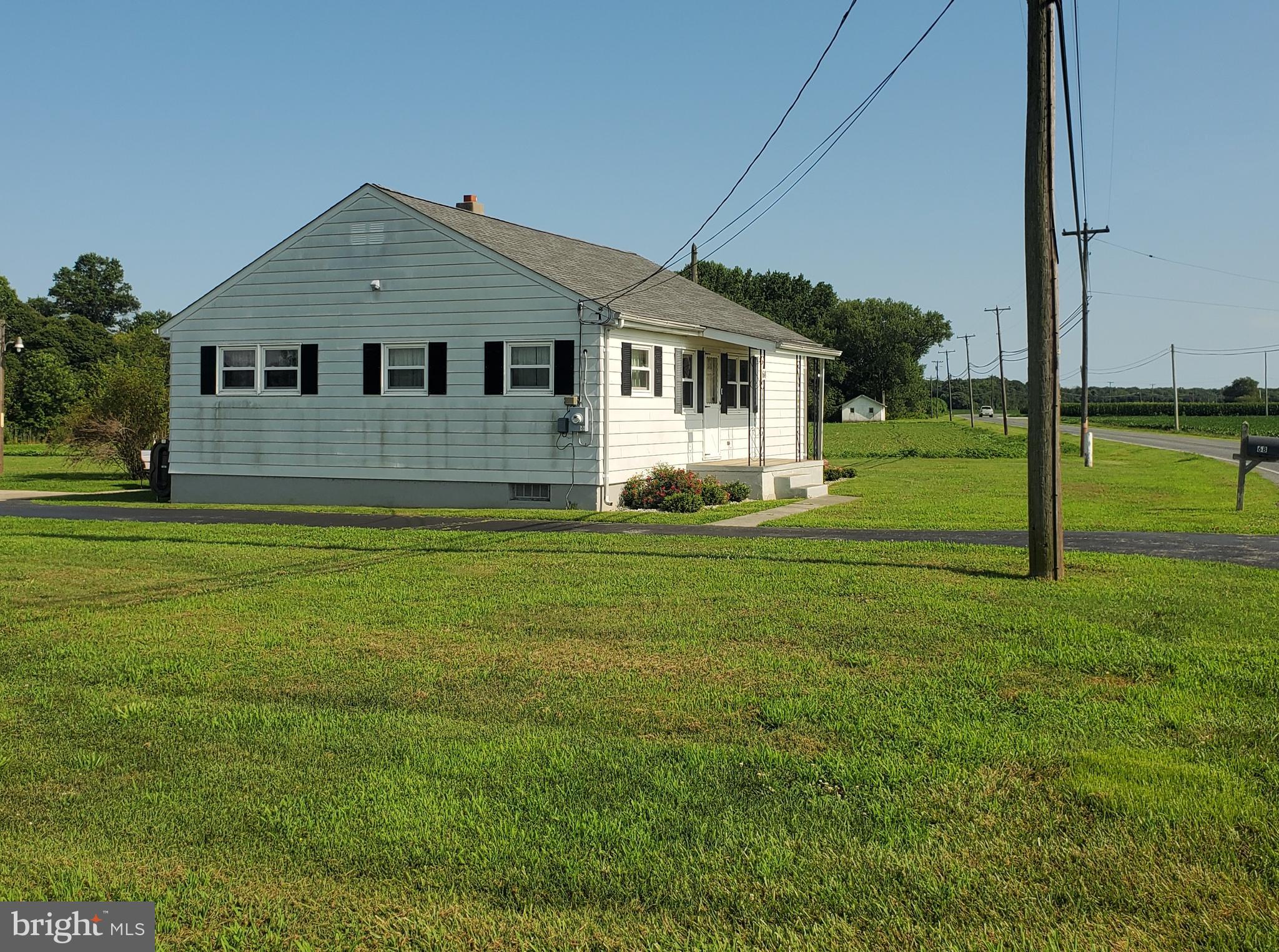 68 Amwellbury Road Salem, NJ 08079 - Photo 4 of 23 a front view of a house with a yard