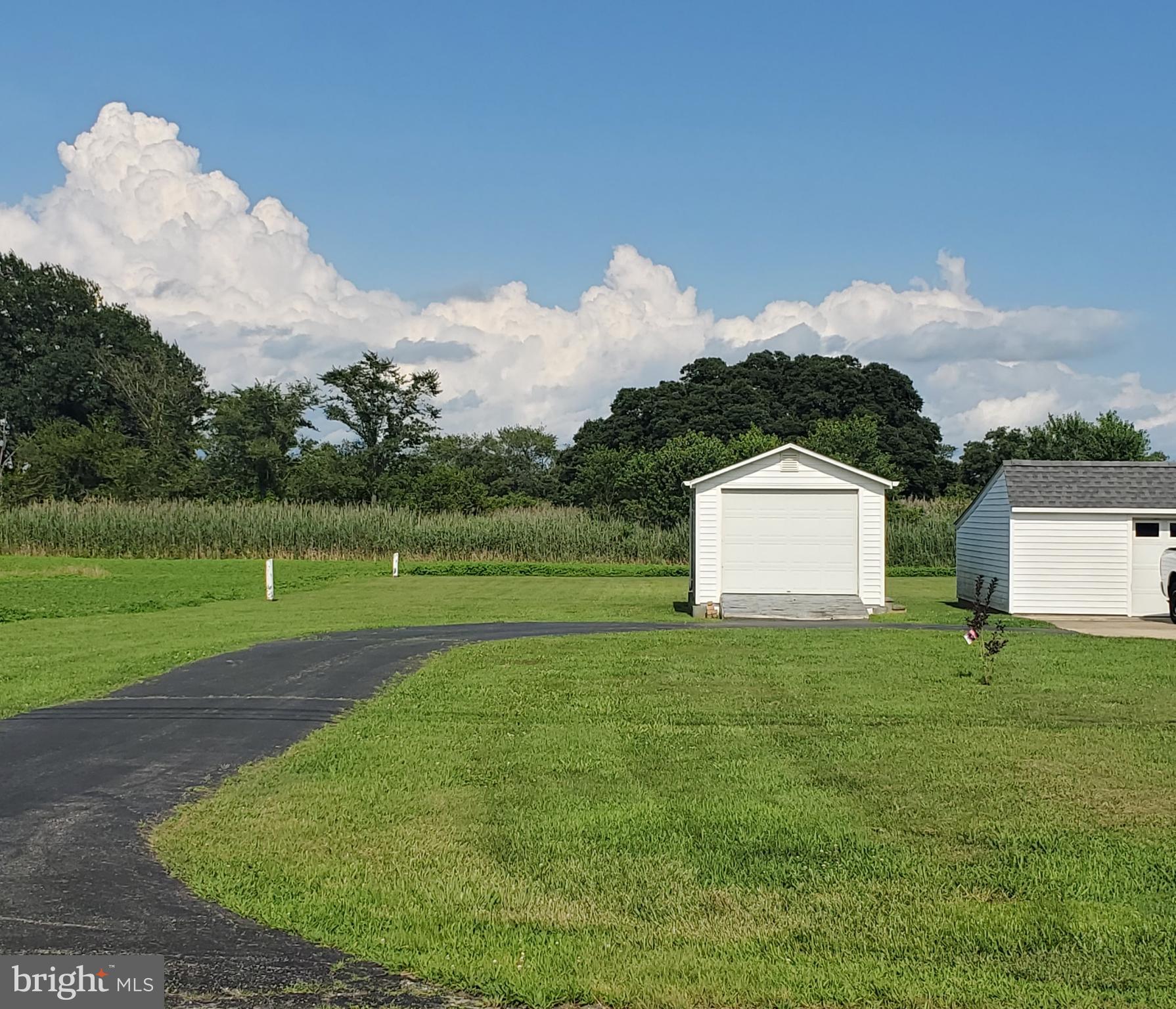 68 Amwellbury Road Salem, NJ 08079 - Photo 5 of 23 a view of a tiny house with a big yard