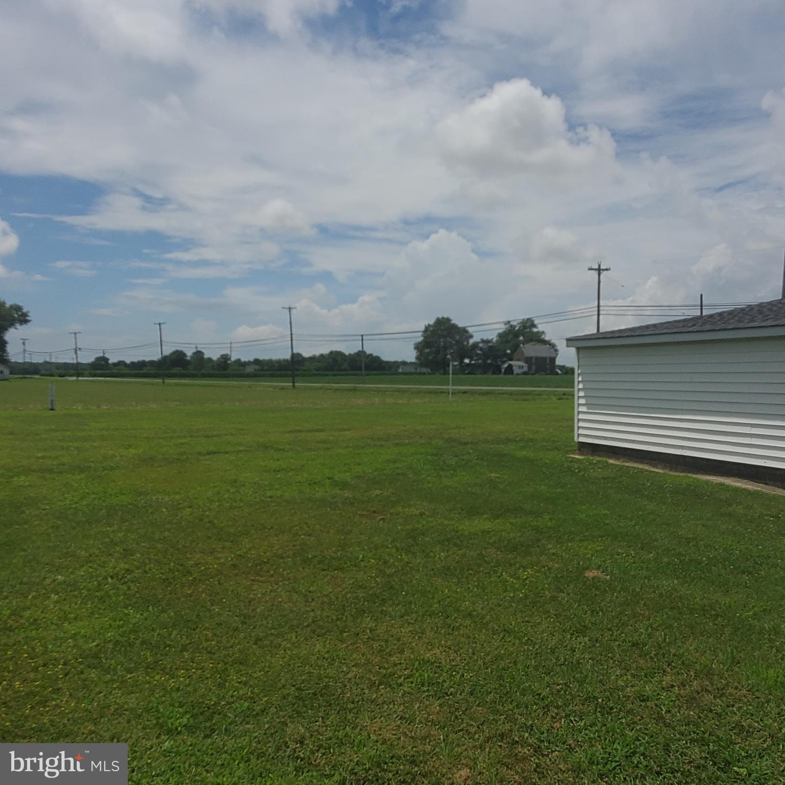 68 Amwellbury Road Salem, NJ 08079 - Photo 6 of 23 a view of a field with an ocean