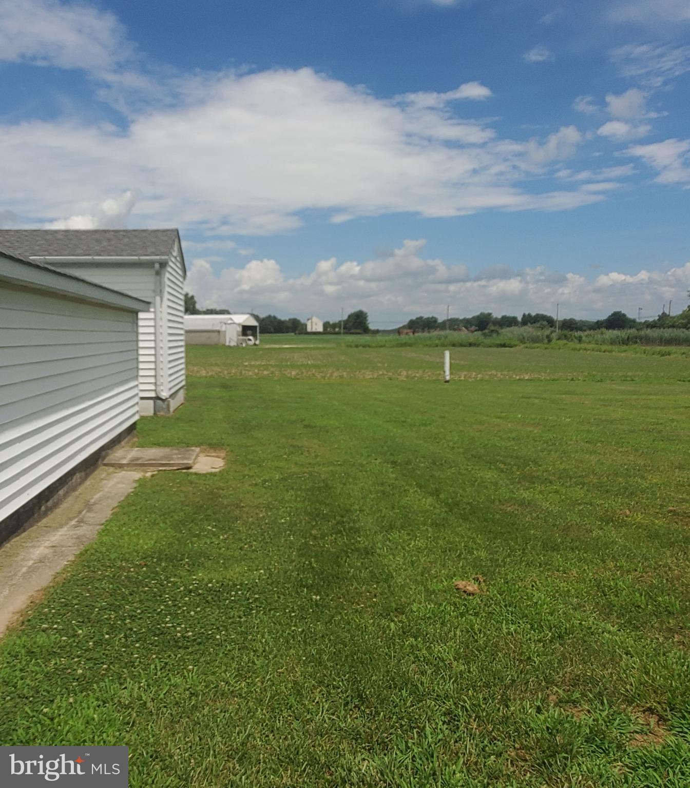 68 Amwellbury Road Salem, NJ 08079 - Photo 7 of 23 a view of an ocean from a yard