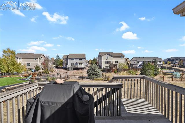 12237 Rio Secco Road Peyton, CO 80831 - Photo 40 of 45 Access to backyard from the upper level
