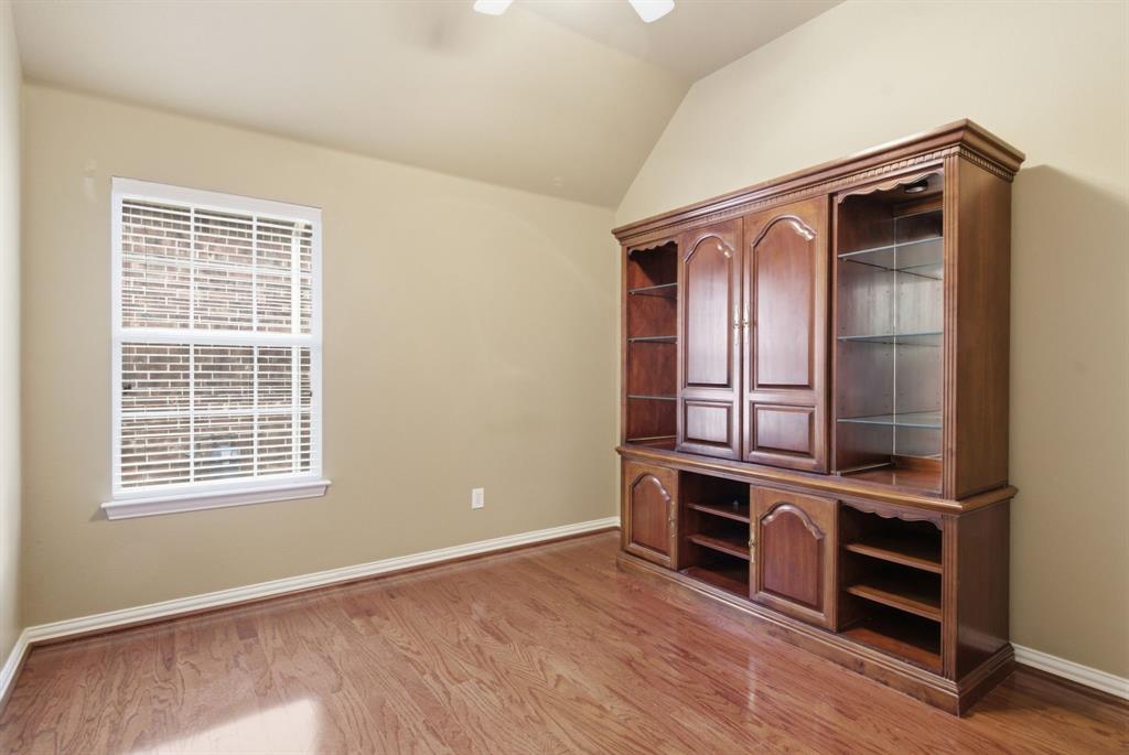 8180 Holliday Road Lantana, TX 76226 - Photo 23 of 31 This bedroom has hard surface floors and could easily be used as an office or craft room