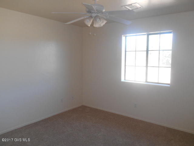 114 Circulo Penjamo Rio Rico, AZ 85648 - Photo 11 of 16 an empty room with a window