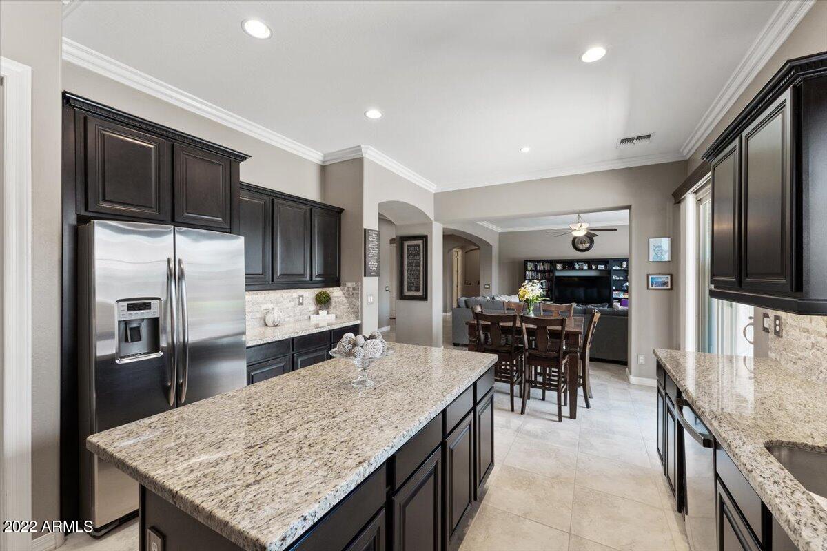 3167 East Warbler Road Gilbert, AZ 85297 - Photo 6 of 18 Kitchen and Dining