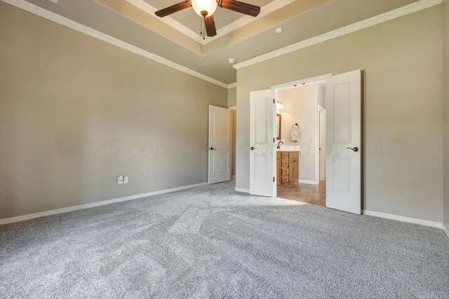 a bathroom with a double vanity sink mirror and shower