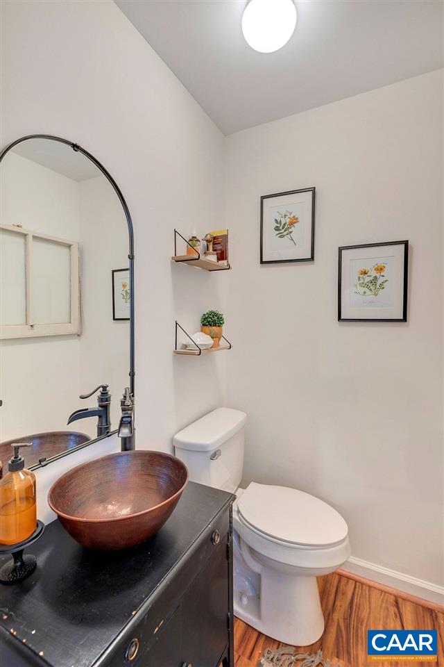 357 Rolkin Road Charlottesville, VA 22911 - Photo 26 of 37 a bathroom with a toilet sink and mirror