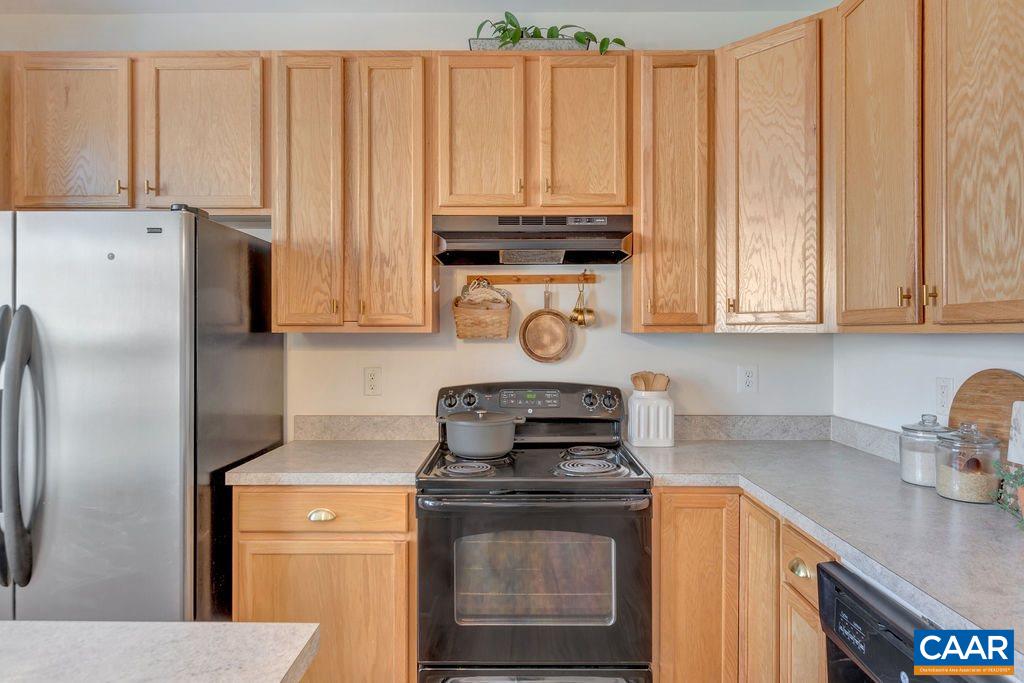 357 Rolkin Road Charlottesville, VA 22911 - Photo 10 of 37 a kitchen with stainless steel appliances granite countertop a refrigerator a stove a sink and dishwasher