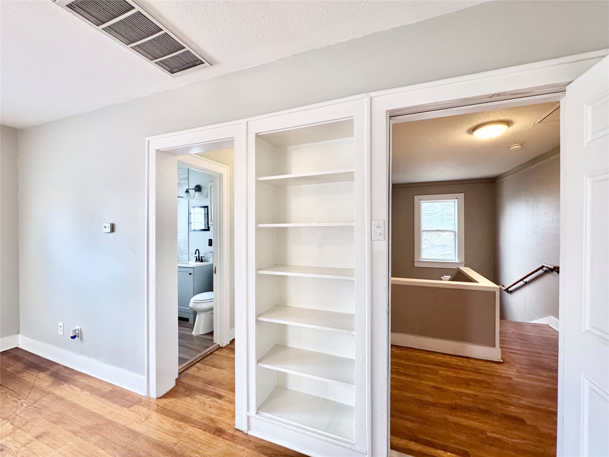 629 East 11th Street, Unit 4 Houston, TX 77008 - Photo 28 of 29 Living area has another door to the shared "lobby" area! Not often used but provides a more direct route to the unit mailboxes situated at the shared "front door" of the building!