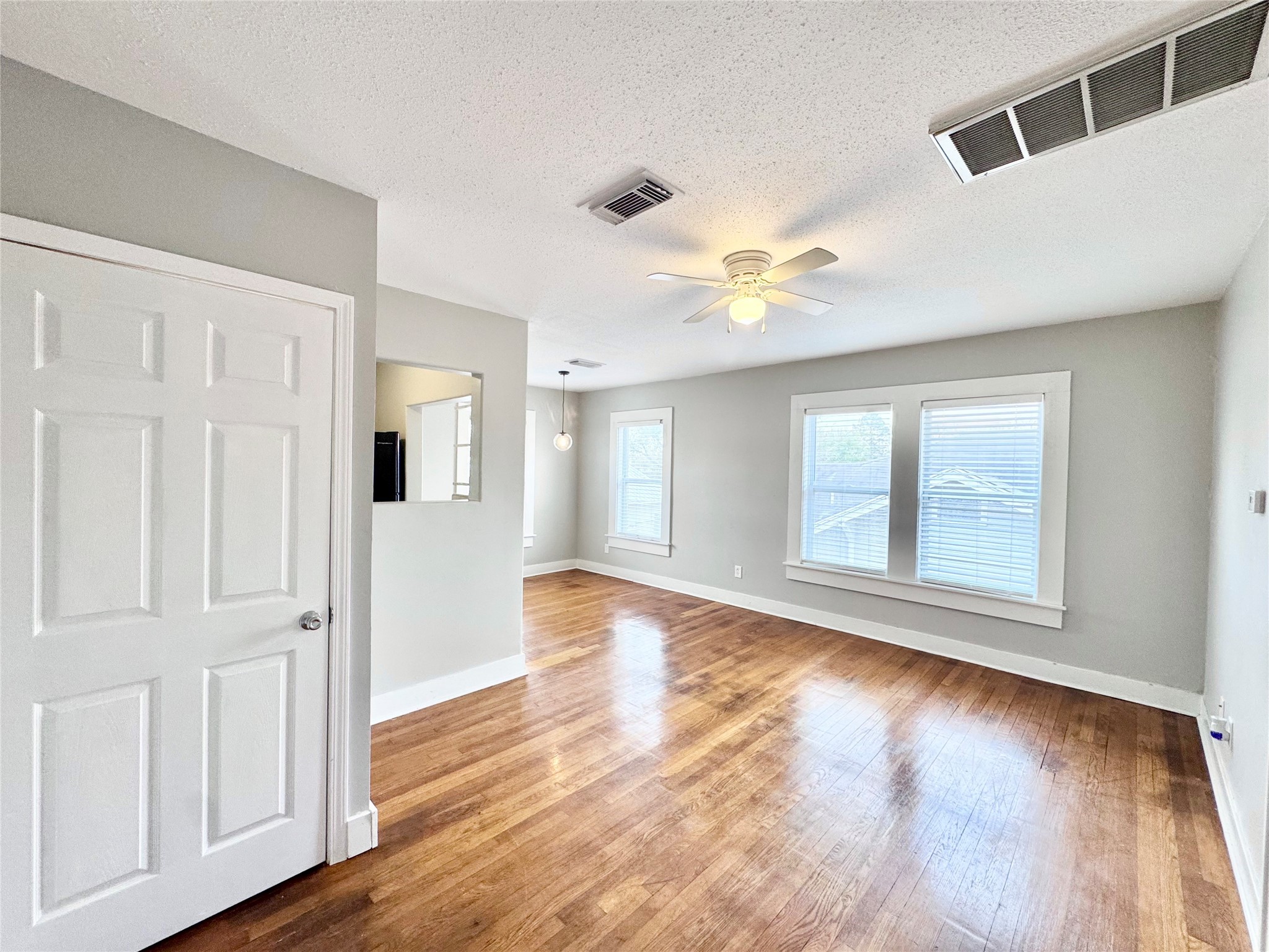 629 East 11th Street, Unit 4 Houston, TX 77008 - Photo 8 of 29 Another shot of living area showing corner closet containing ...
