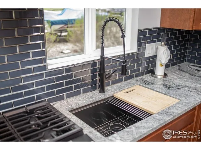 a view of a living room and bathroom