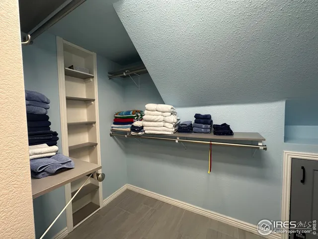 a view of a room with shelves