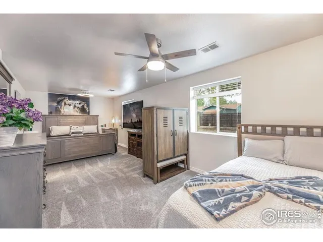 a view of a kitchen with furniture and windows