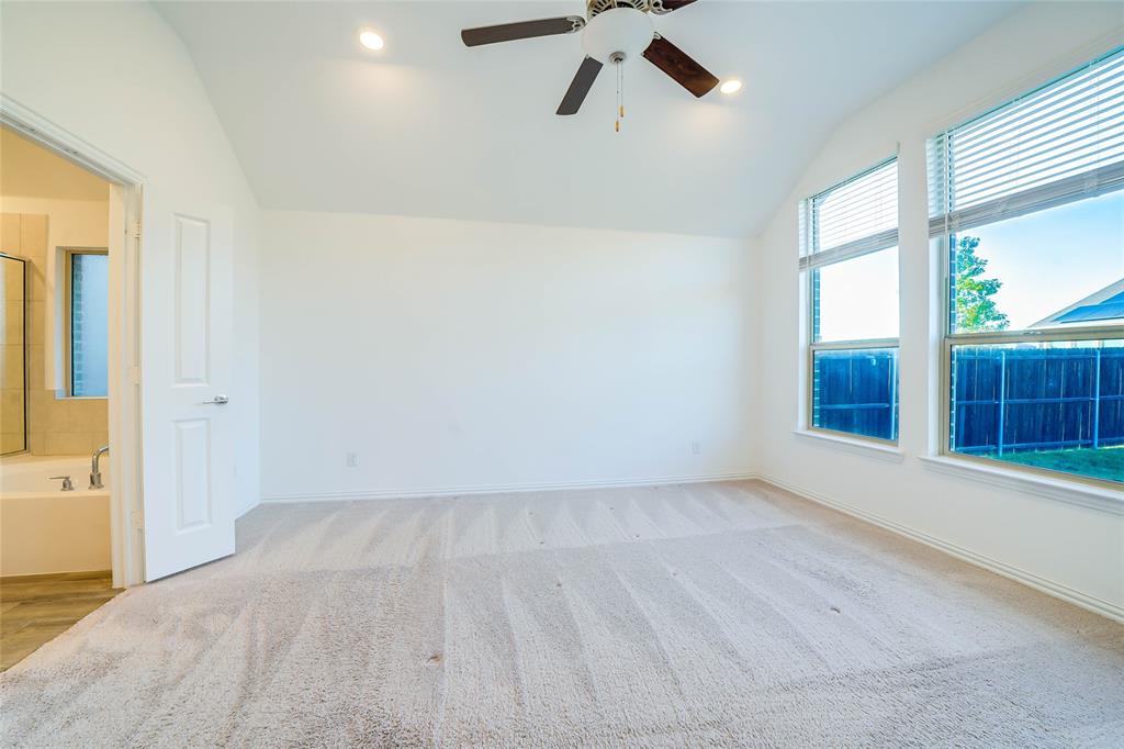 3420 Prairie Place McKinney, TX 75071 - Photo 15 of 37 wooden floor in an empty room with a window
