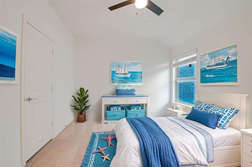 3420 Prairie Place McKinney, TX 75071 - Photo 19 of 37 a bedroom with bed and a painting on the wall