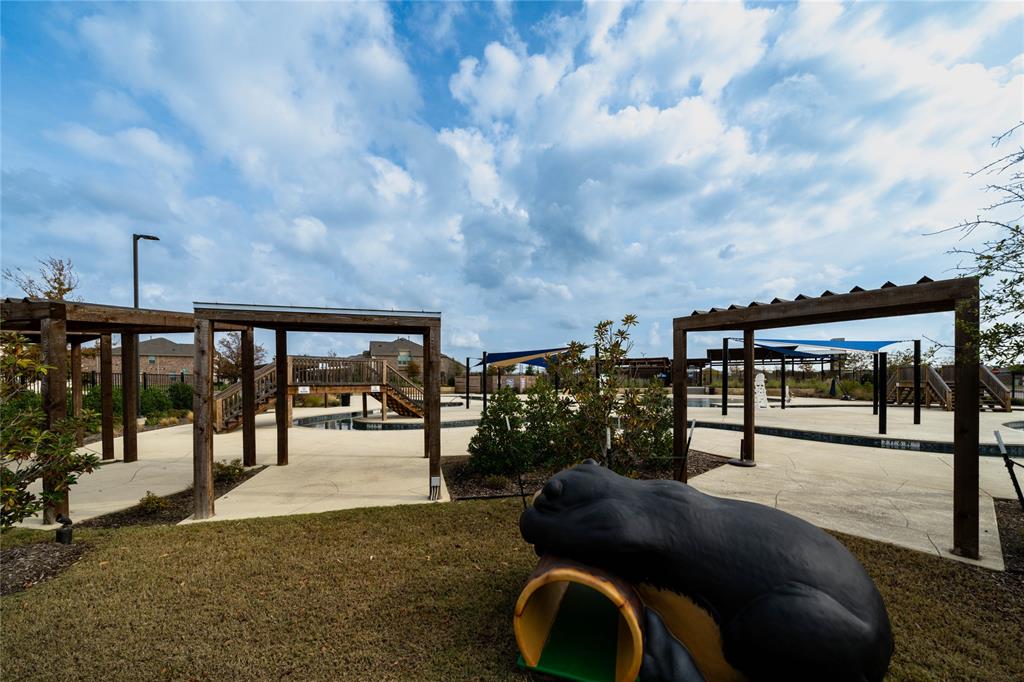 3420 Prairie Place McKinney, TX 75071 - Photo 35 of 37 a view of a chairs and tables in the back yard