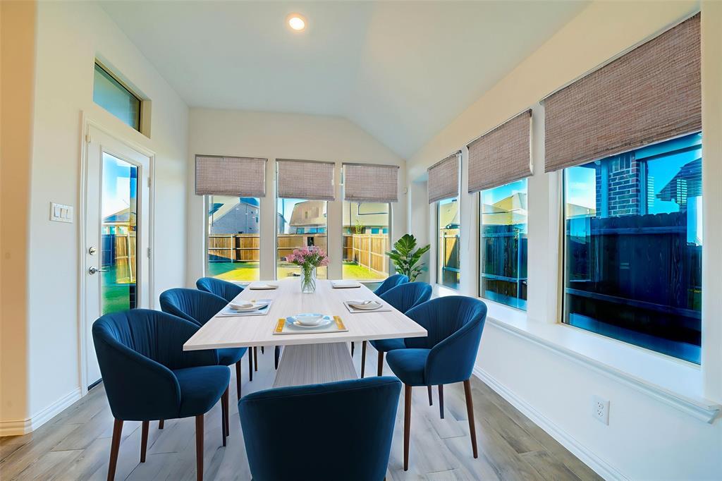 3420 Prairie Place McKinney, TX 75071 - Photo 9 of 37 a view of a dining room with furniture window and outside view
