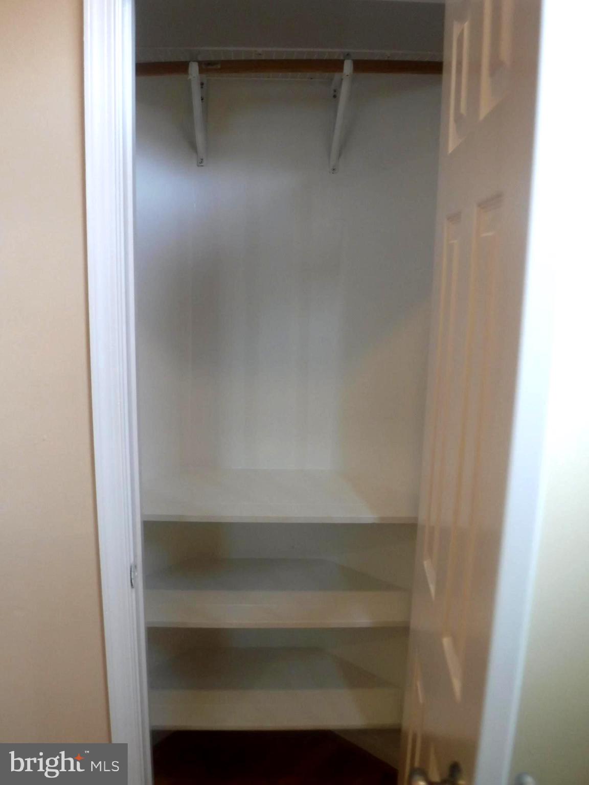 8714 Wadebrook Terrace Springfield, VA 22153 - Photo 4 of 35 Guest Coat Closet at Entering Foyer