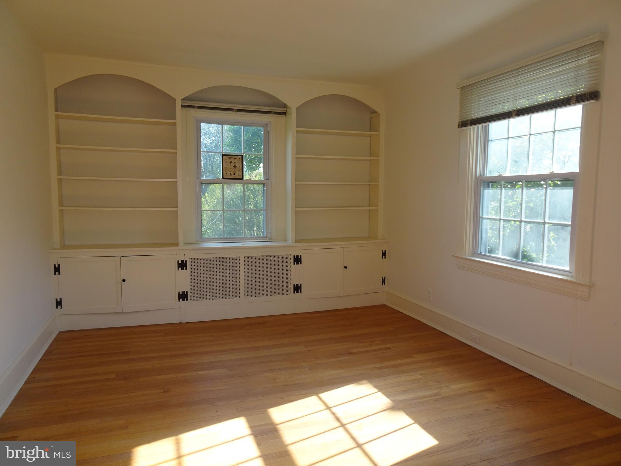 343 Tunbridge Road Baltimore, MD 21212 - Photo 22 of 39 SECOND BEDROOM WITH BUILT IN BOOK CASES & WD FLRS